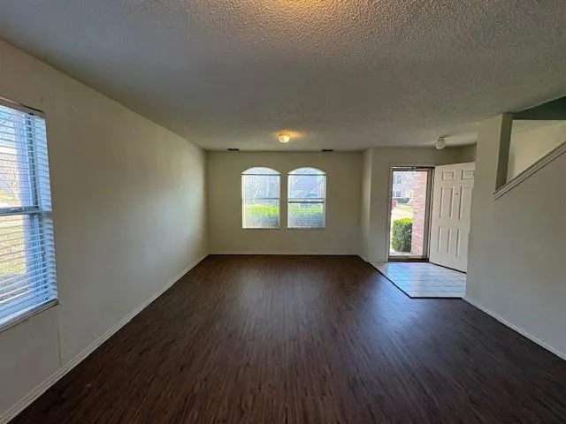 a view of a kitchen with windows