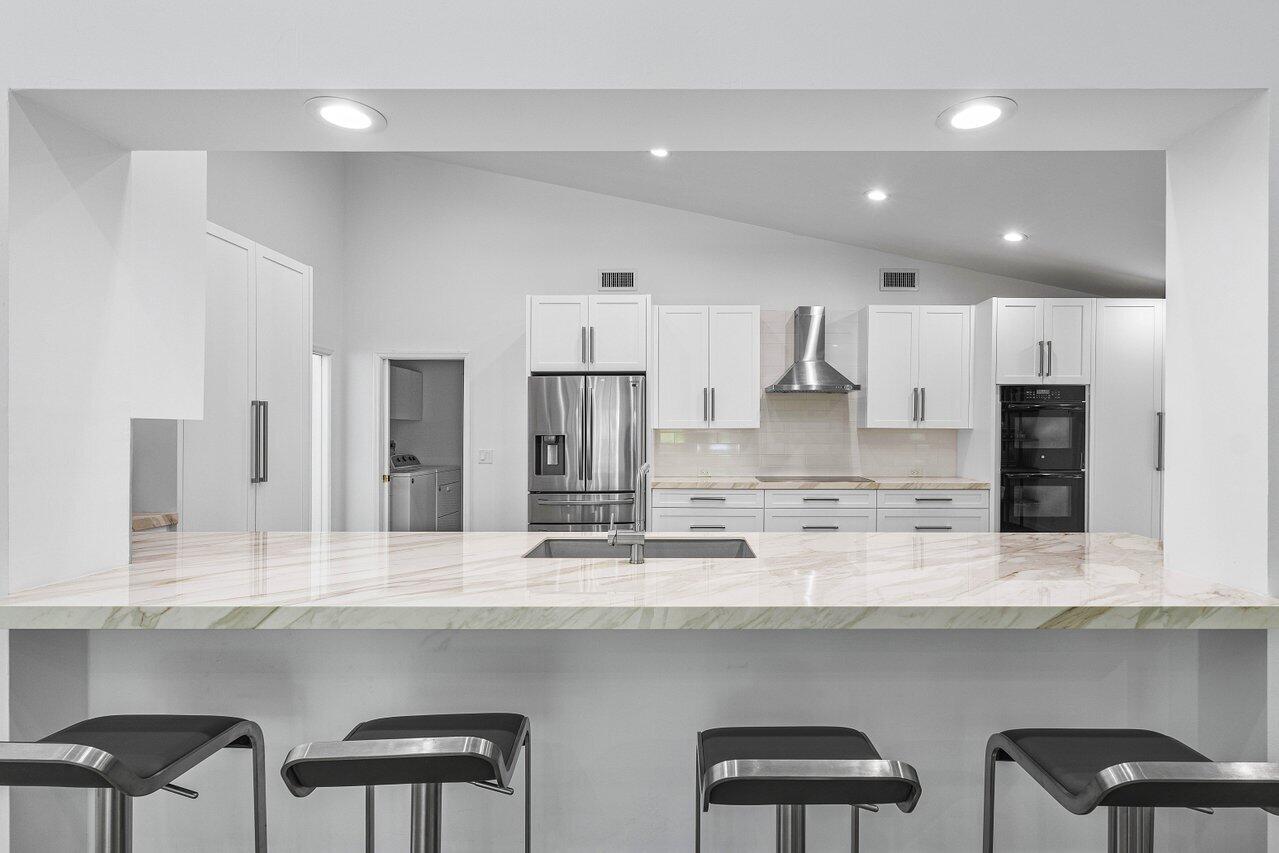 4564 Bocaire Boulevard Boca Raton, FL 33487 - Photo 18 of 64 Kitchen island
