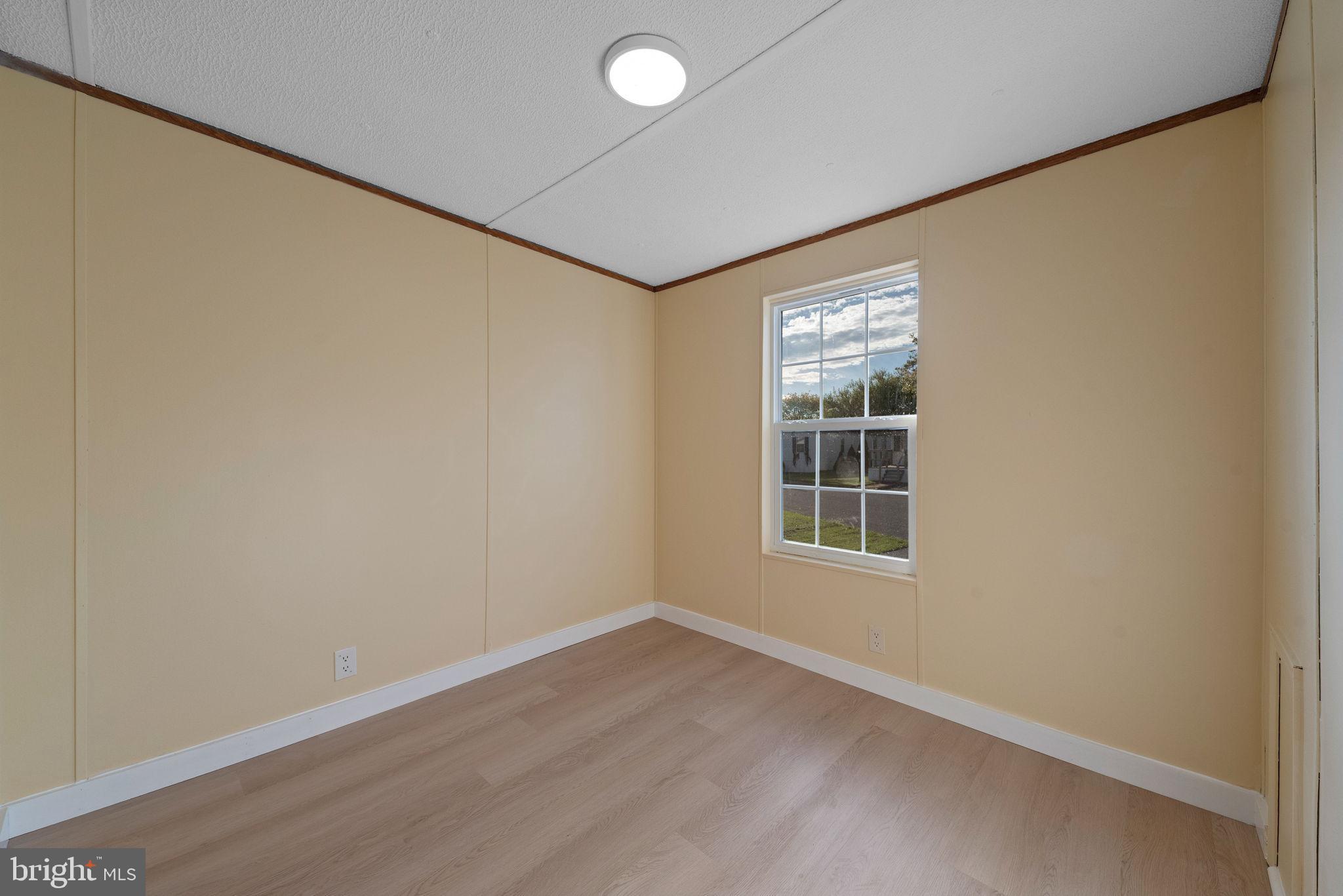 31 Davis Avenue Gettysburg, PA 17325 - Photo 16 of 23 an empty room with wooden floor and windows