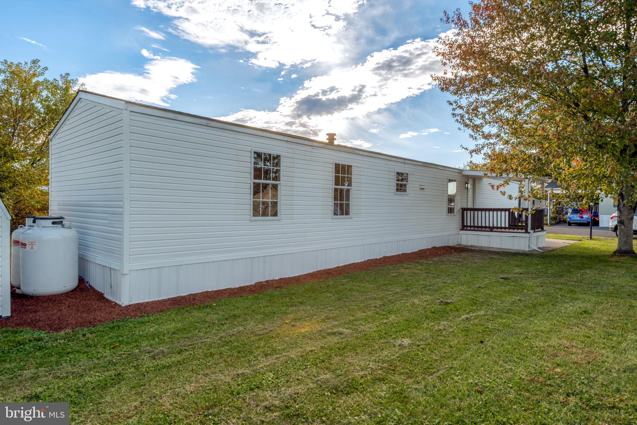 31 Davis Avenue Gettysburg, PA 17325 - Photo 23 of 23 a view of a backyard with plants and a tree