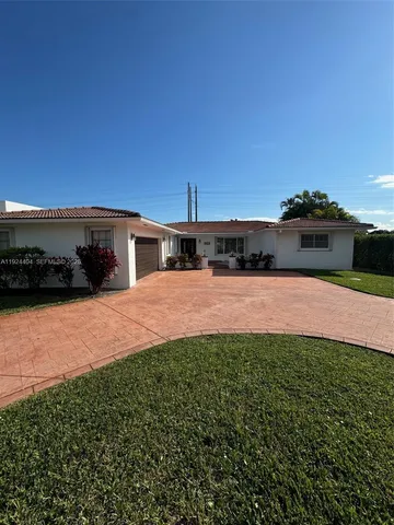 a view of a yard with an outdoor space
