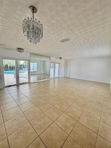a view of a livingroom with a large window
