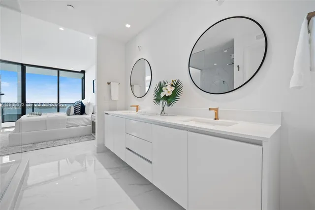 a view of a swimming pool with an outdoor seating