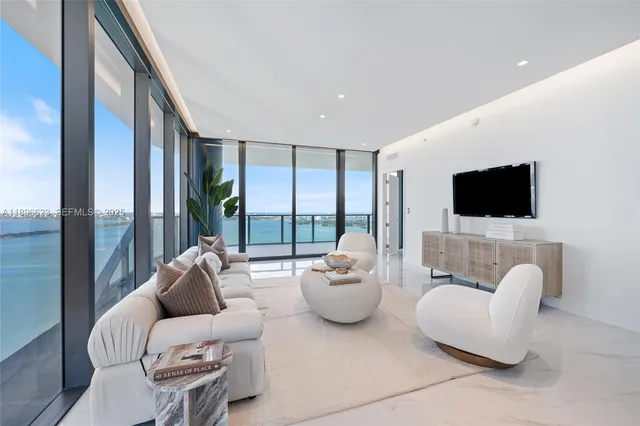 a spacious bathroom with a double sink shower and a mirror