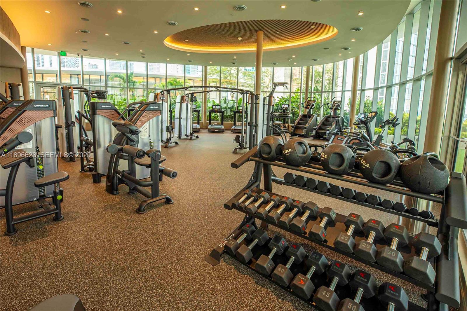 700 Northeast 24th Street, Unit 4401 Miami, FL 33137 - Photo 69 of 96 a view of a room with gym equipment