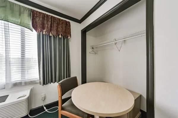 a bathroom with a toilet and a sink