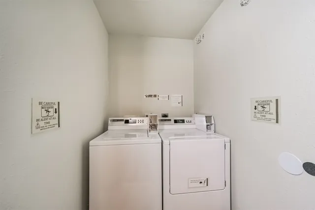 a front view of a building with a road