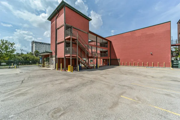 a view of a building with a street