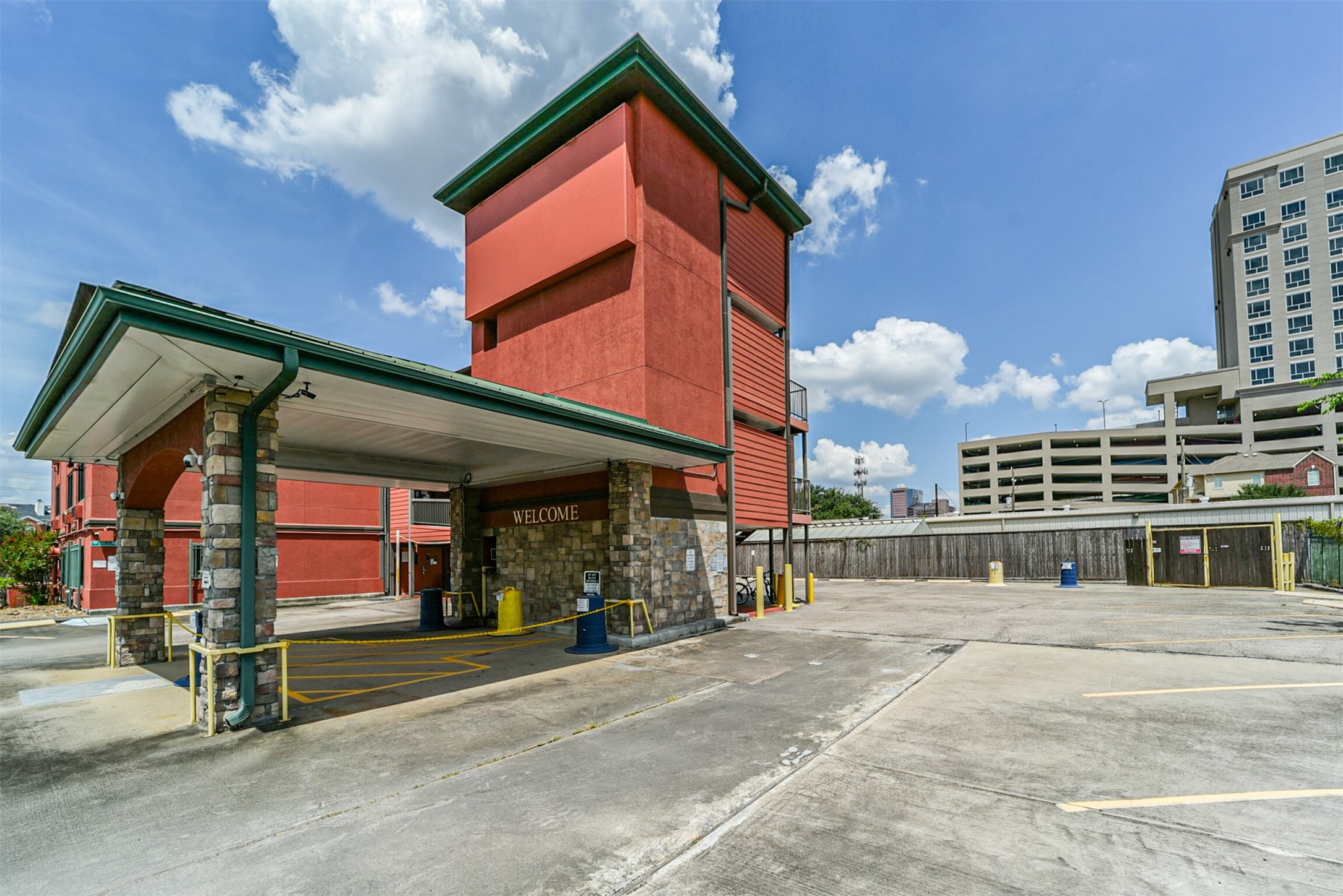 1025 Swanson Street, Unit 309 Houston, TX 77030 - Photo 2 of 21 a front view of a building with street