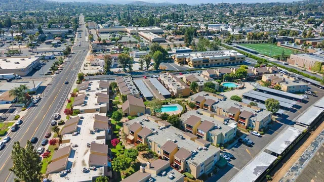 an aerial view of a city with lots of residential buildings