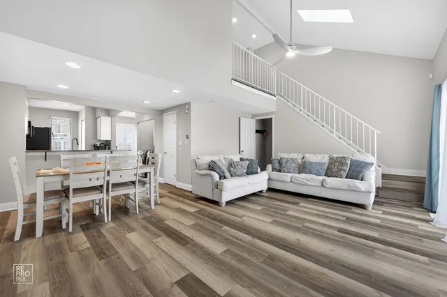 a living room with furniture and a table