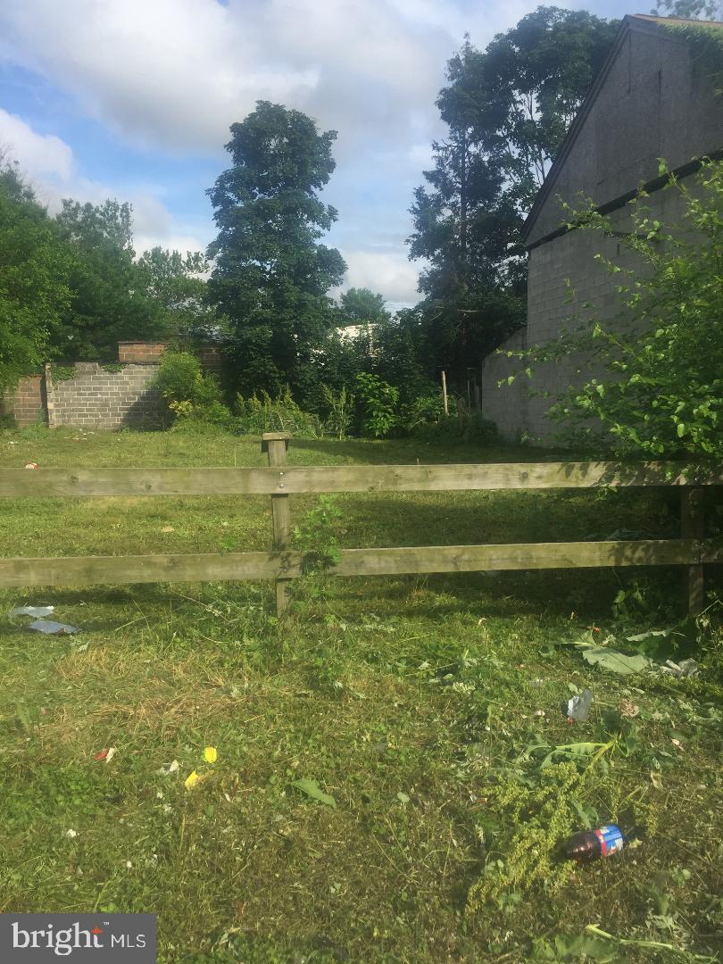 4669 Hawthorne Street Philadelphia, PA 19124 - Photo 2 of 5 a large body of water with a bench in the background