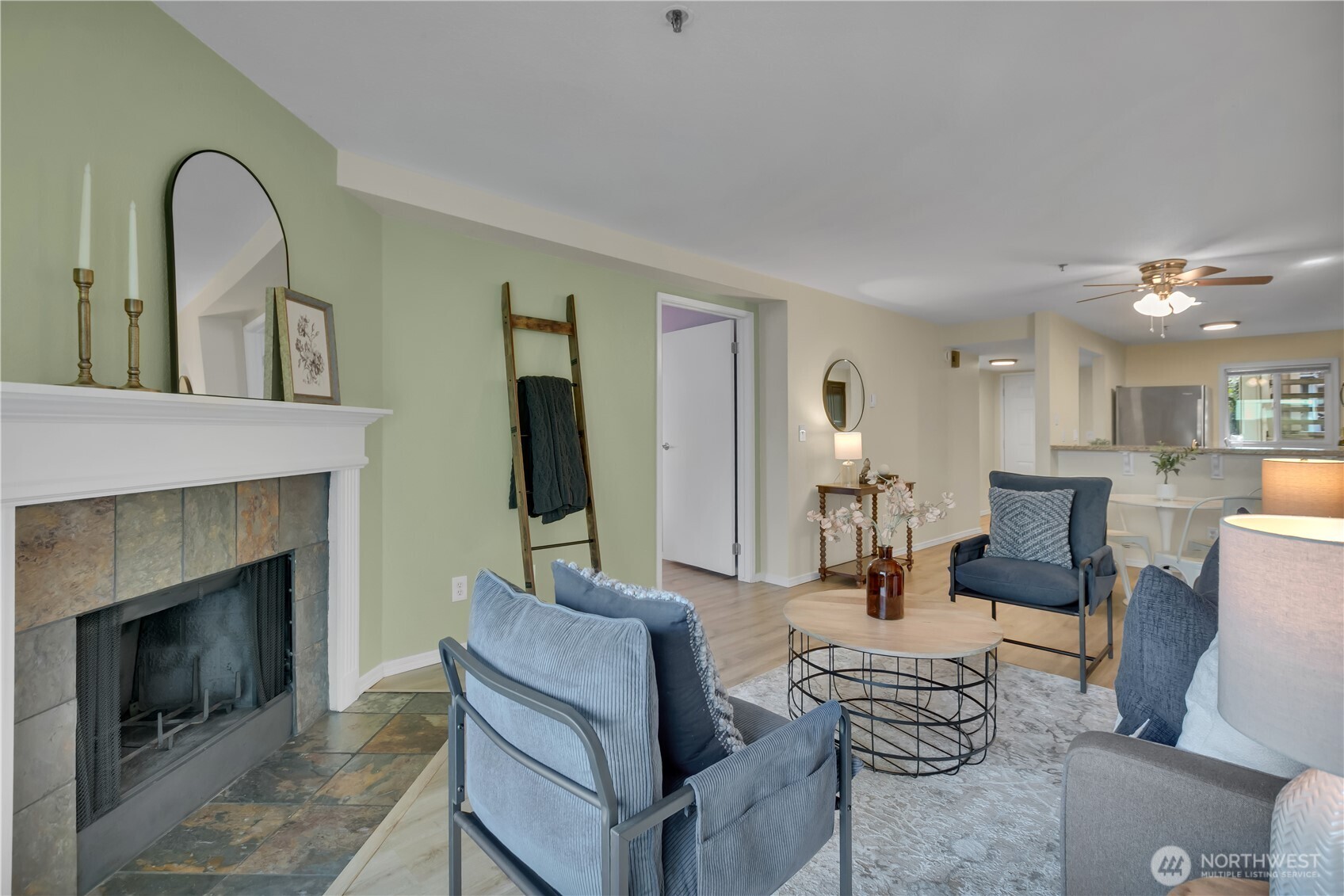 25035 98th Place South, Unit D102 Kent, WA 98030 - Photo 12 of 28 a living room with furniture and a fireplace