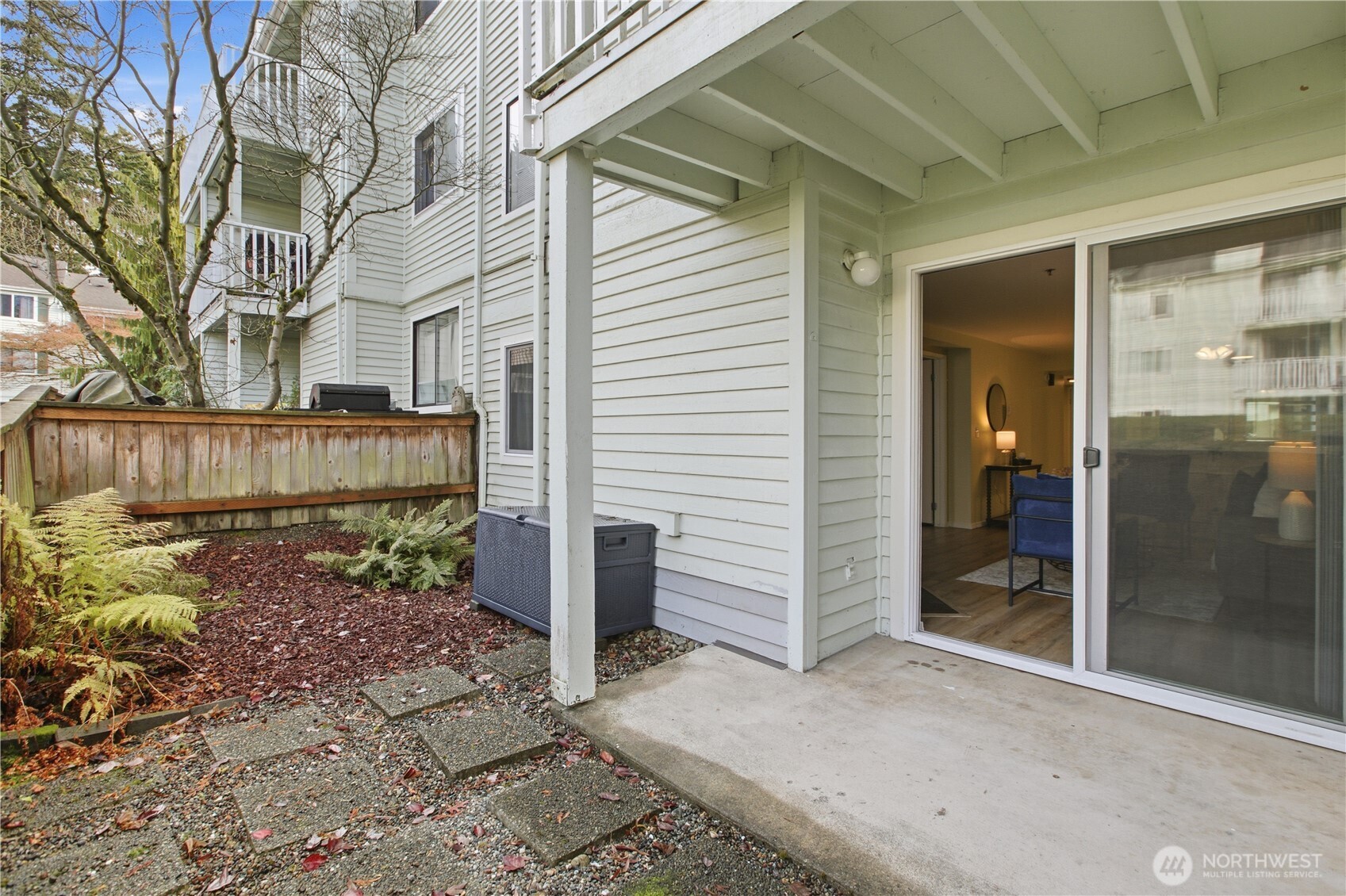 25035 98th Place South, Unit D102 Kent, WA 98030 - Photo 19 of 28 a view of a house with a yard