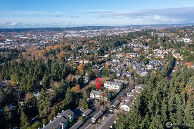 a view of a car park in front of a house