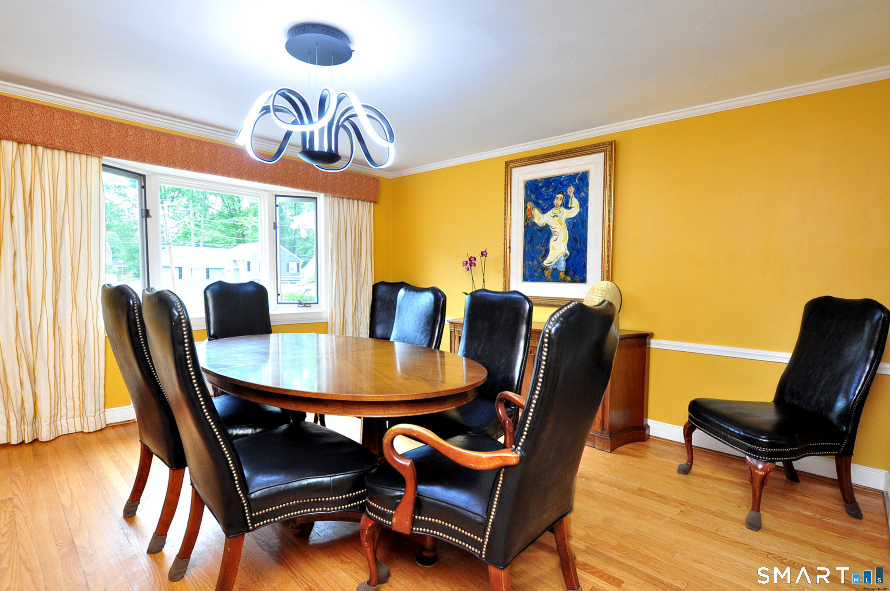 44 Miamis Road West Hartford, CT 06117 - Photo 10 of 39 a dining room with furniture and a large window