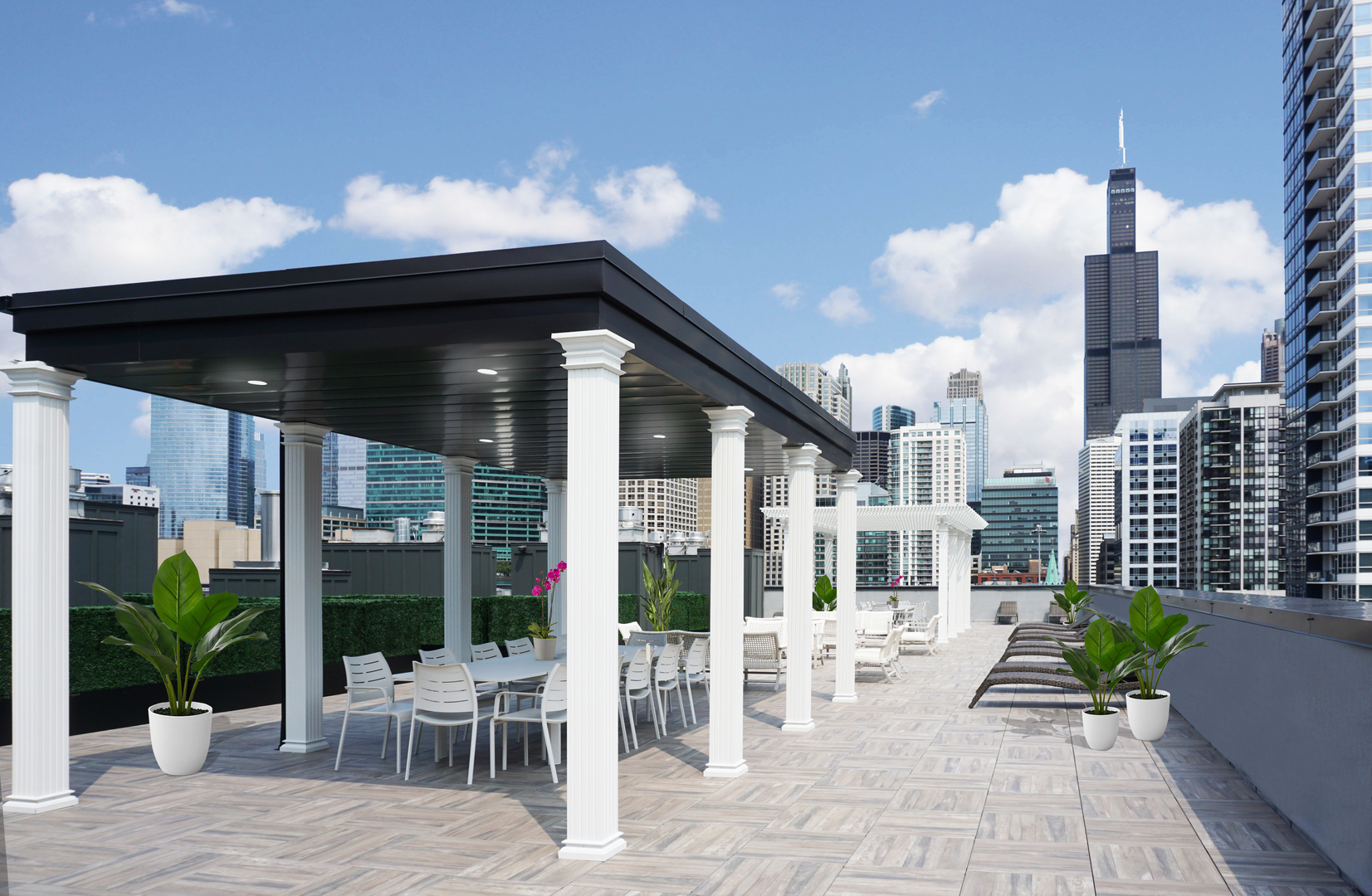 812 West Adams Street, Unit 613 Chicago, IL 60607 - Photo 30 of 32 a view of a patio with a table and chairs and potted plants