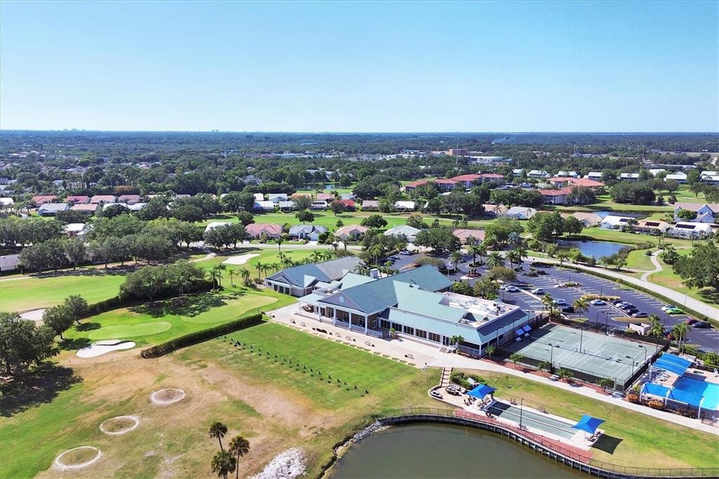 6409 Stone River Road Bradenton, FL 34203 - Photo 55 of 55 an aerial view of a city with lots of residential buildings ocean and mountain view in back