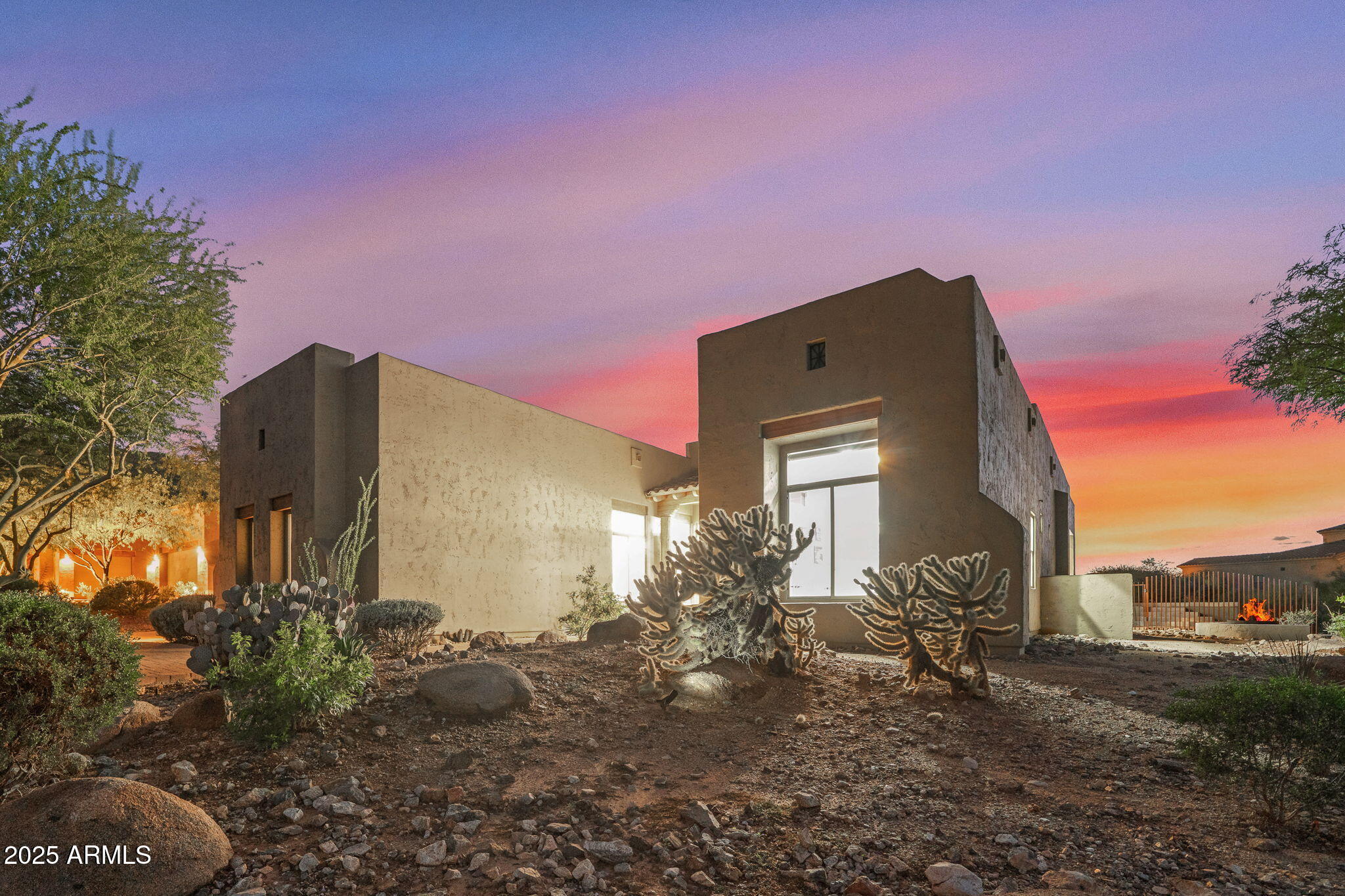 10302 South 16th Avenue Phoenix, AZ 85041 - Photo 15 of 74 a backyard of a house with table and chairs