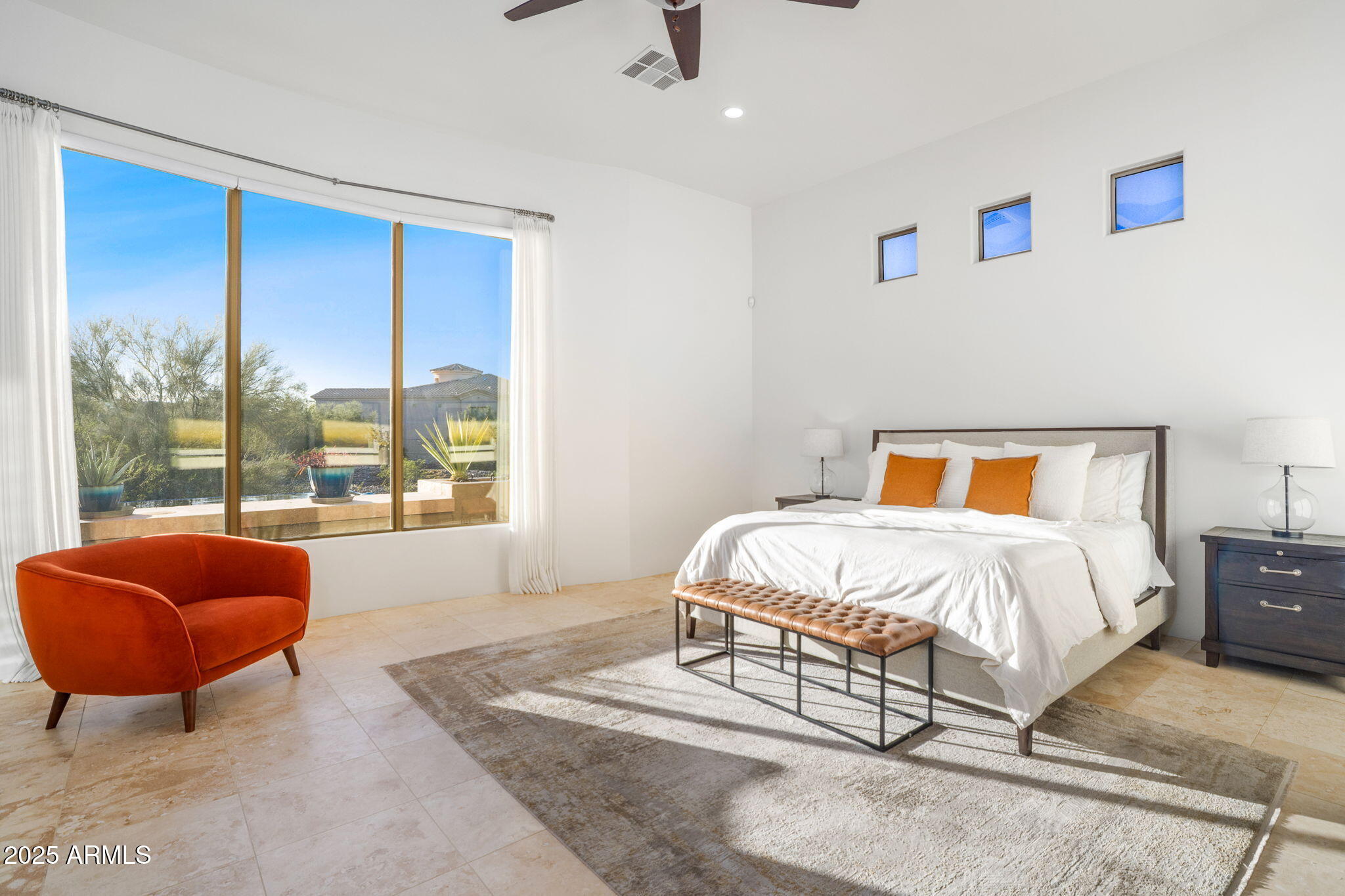 10302 South 16th Avenue Phoenix, AZ 85041 - Photo 44 of 74 a bedroom with furniture and a large window