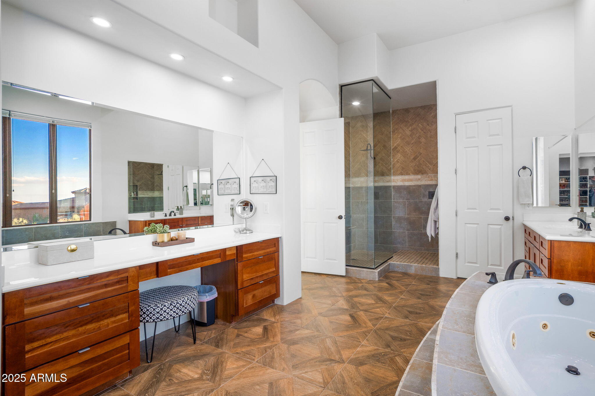 10302 South 16th Avenue Phoenix, AZ 85041 - Photo 47 of 74 a large bathroom with a tub sink shower and mirror