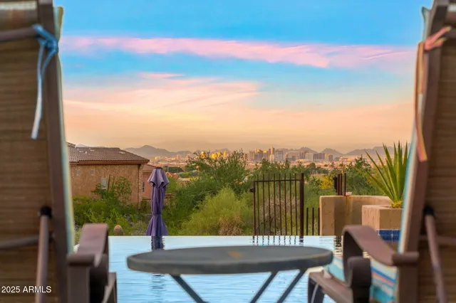 a view of a balcony with chairs