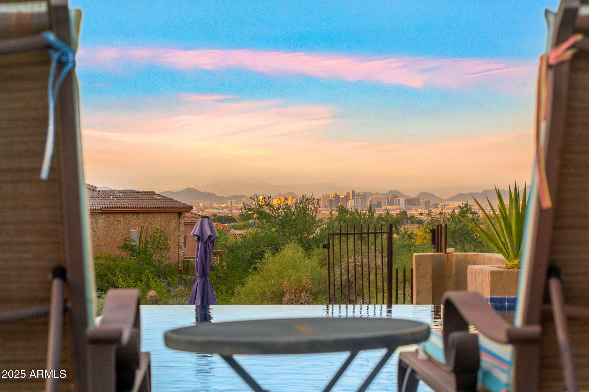 10302 South 16th Avenue Phoenix, AZ 85041 - Photo 6 of 74 a view of a balcony with a lake view