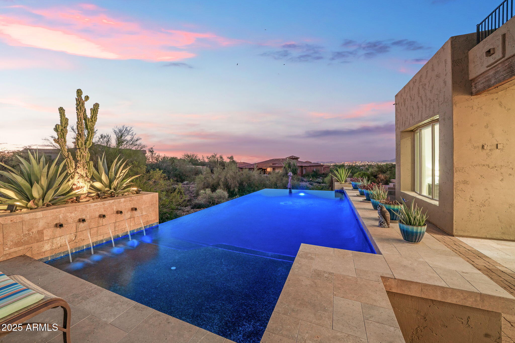 10302 South 16th Avenue Phoenix, AZ 85041 - Photo 9 of 74 a view of a balcony with chairs