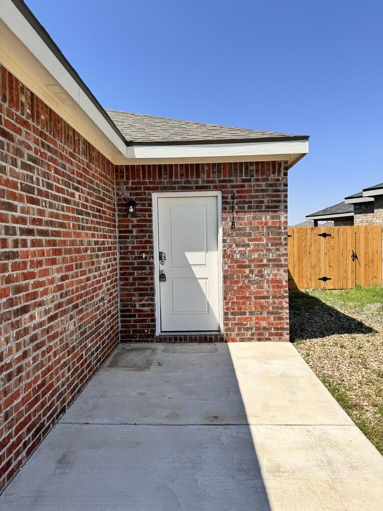 5711 Kemper Street, Unit B Lubbock, TX 79416 - Photo 1 of 20 a view of entryway