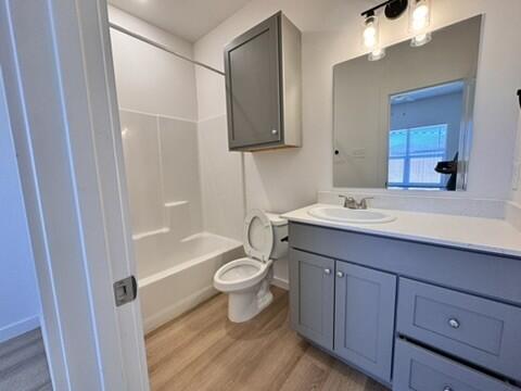 5711 Kemper Street, Unit B Lubbock, TX 79416 - Photo 13 of 20 a bathroom with a sink a toilet and bathtub