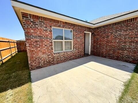 5711 Kemper Street, Unit B Lubbock, TX 79416 - Photo 20 of 20 a view of house with backyard