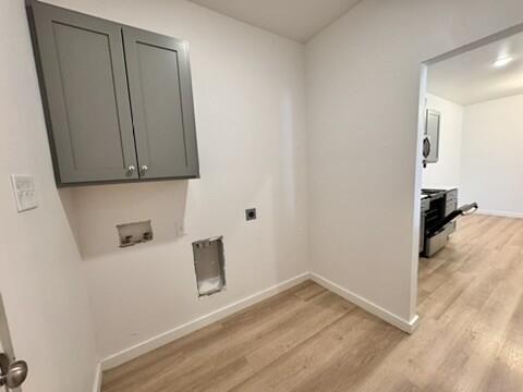 5711 Kemper Street, Unit B Lubbock, TX 79416 - Photo 6 of 20 a view of kitchen with wooden floor