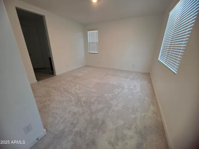 a bathroom with a double vanity sink and mirror