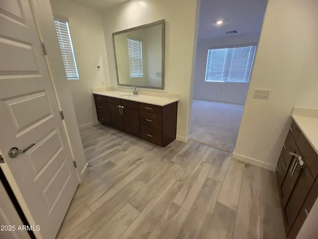 a view of an empty walk in closet