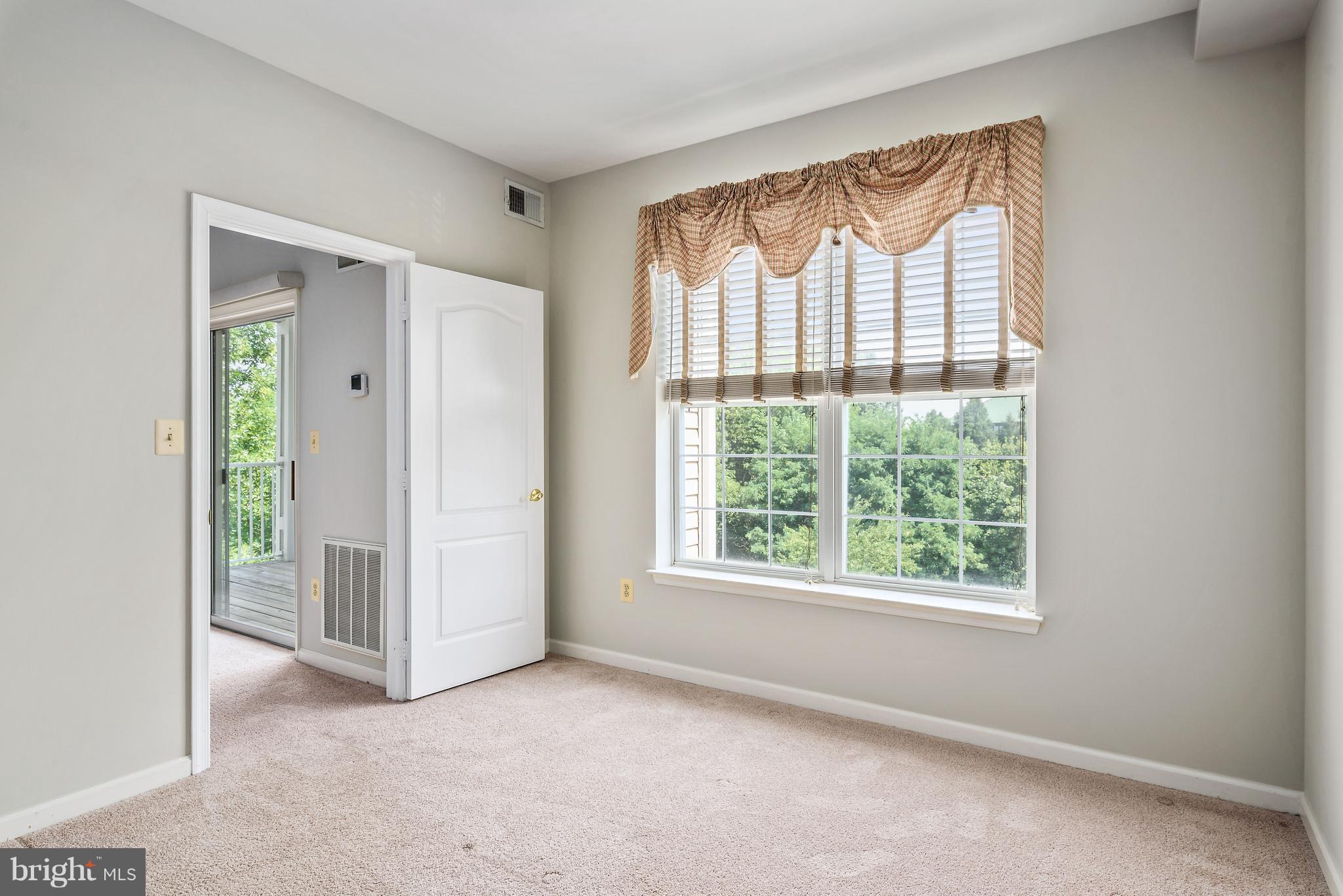 20903 Cedarpost Square, Unit 301 Ashburn, VA 20147 - Photo 9 of 30 Bedroom 2