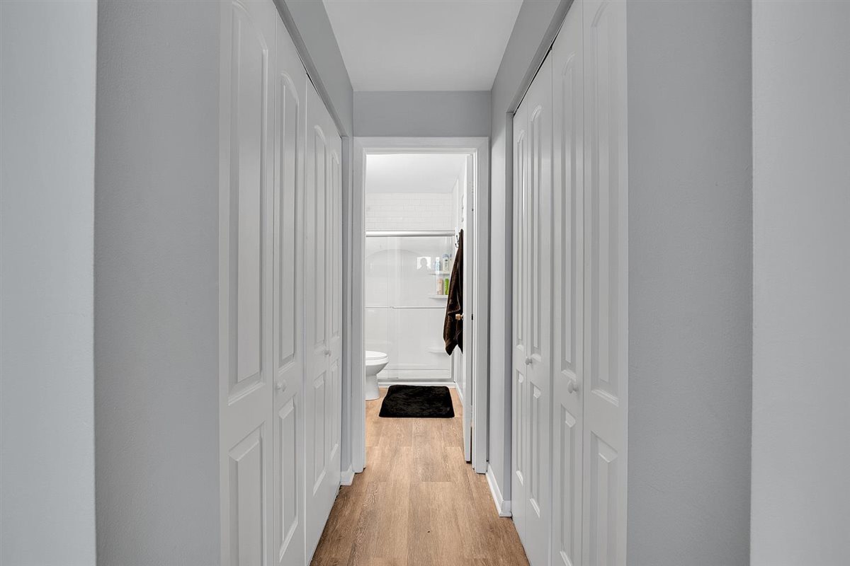 850 South Lorraine Road, Unit 3B Wheaton, IL 60189 - Photo 18 of 33 a view of a hallway with a white walls