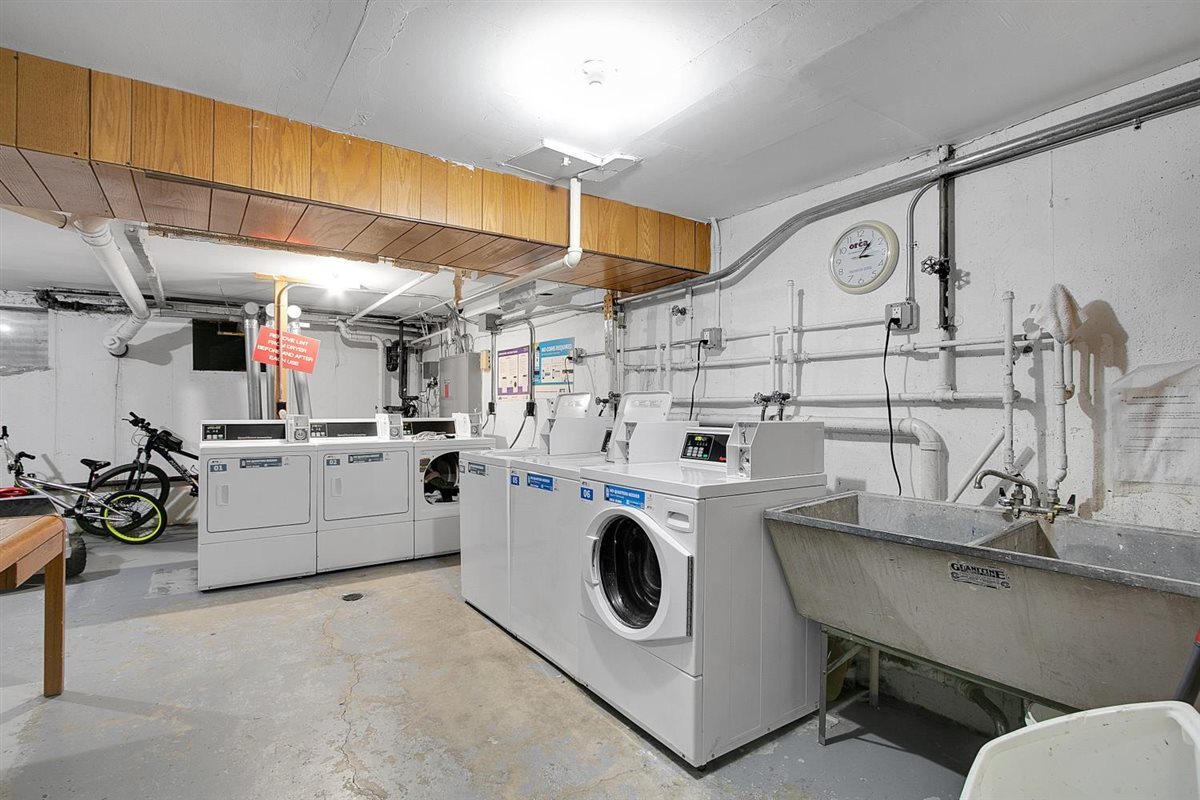 850 South Lorraine Road, Unit 3B Wheaton, IL 60189 - Photo 29 of 33 a utility room with dryer and washer