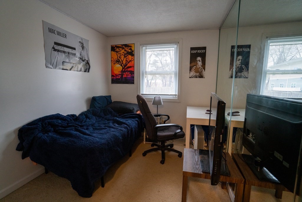 115 Belchertown Road Amherst, MA 01002 - Photo 14 of 18 a living room with furniture and a window
