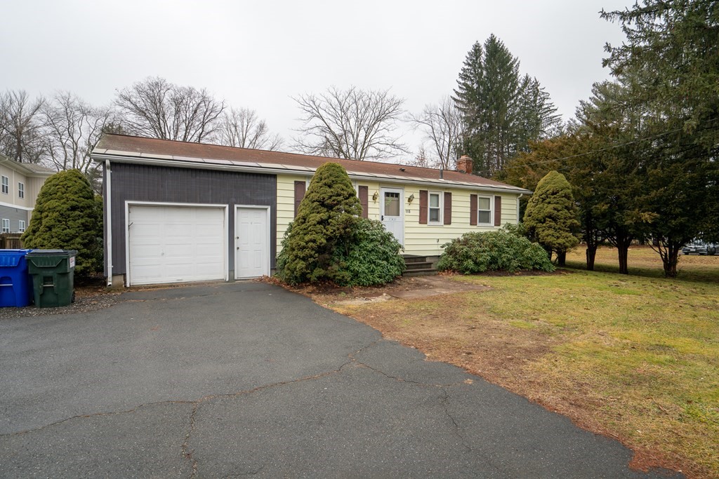 115 Belchertown Road Amherst, MA 01002 - Photo 2 of 18 a view of a house with a yard and garage