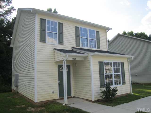 4360 Haverty Drive Raleigh, NC 27610 - Photo 2 of 9 a front view of a house with a yard