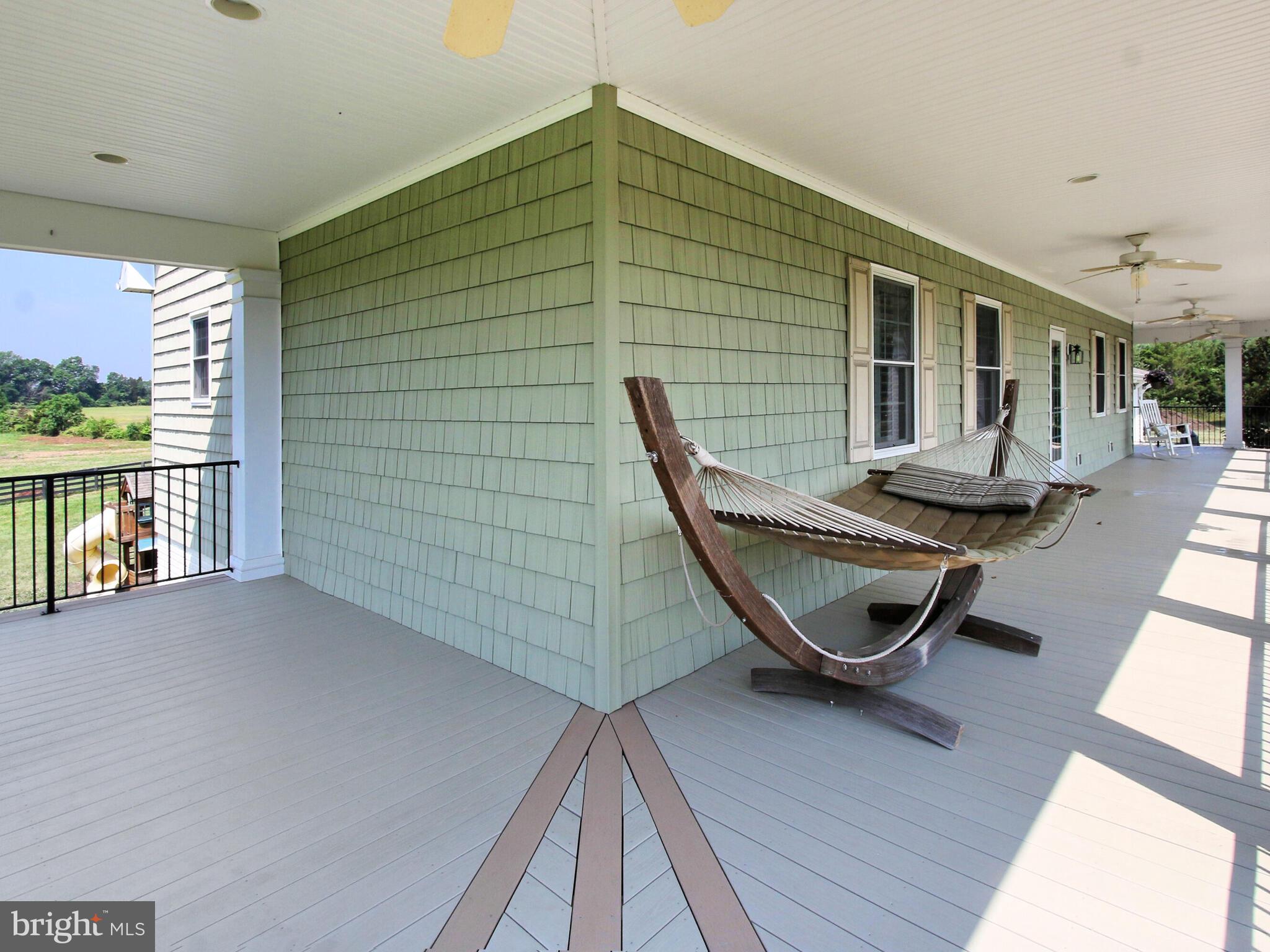 4386 Catlett Road Midland, VA 22728 - Photo 15 of 97 Trex wrap around porch