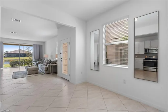 $385,000 | 2850 Blossom Way, Naples, FL 34120