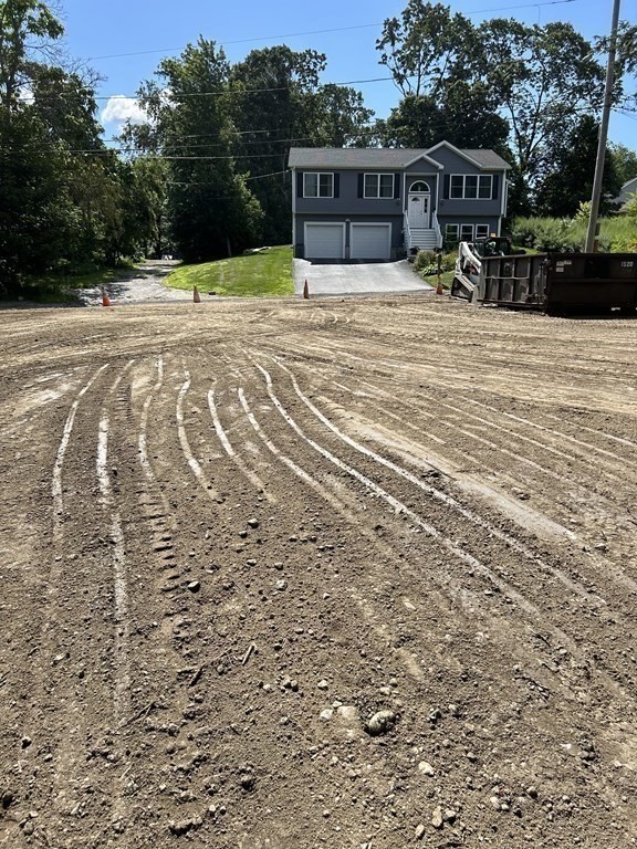 3 Crest Avenue Worcester, MA 01607 - Photo 2 of 9 a front view of a house with a yard