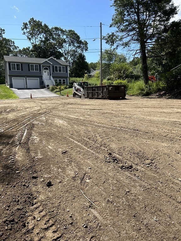 3 Crest Avenue Worcester, MA 01607 - Photo 5 of 9 a backyard of a house with table and chairs