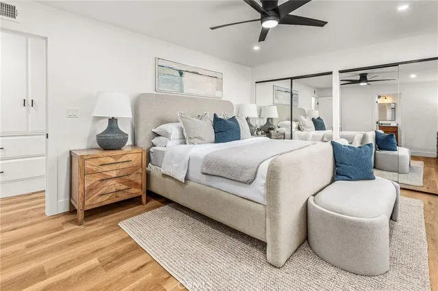 a bedroom with bed and window