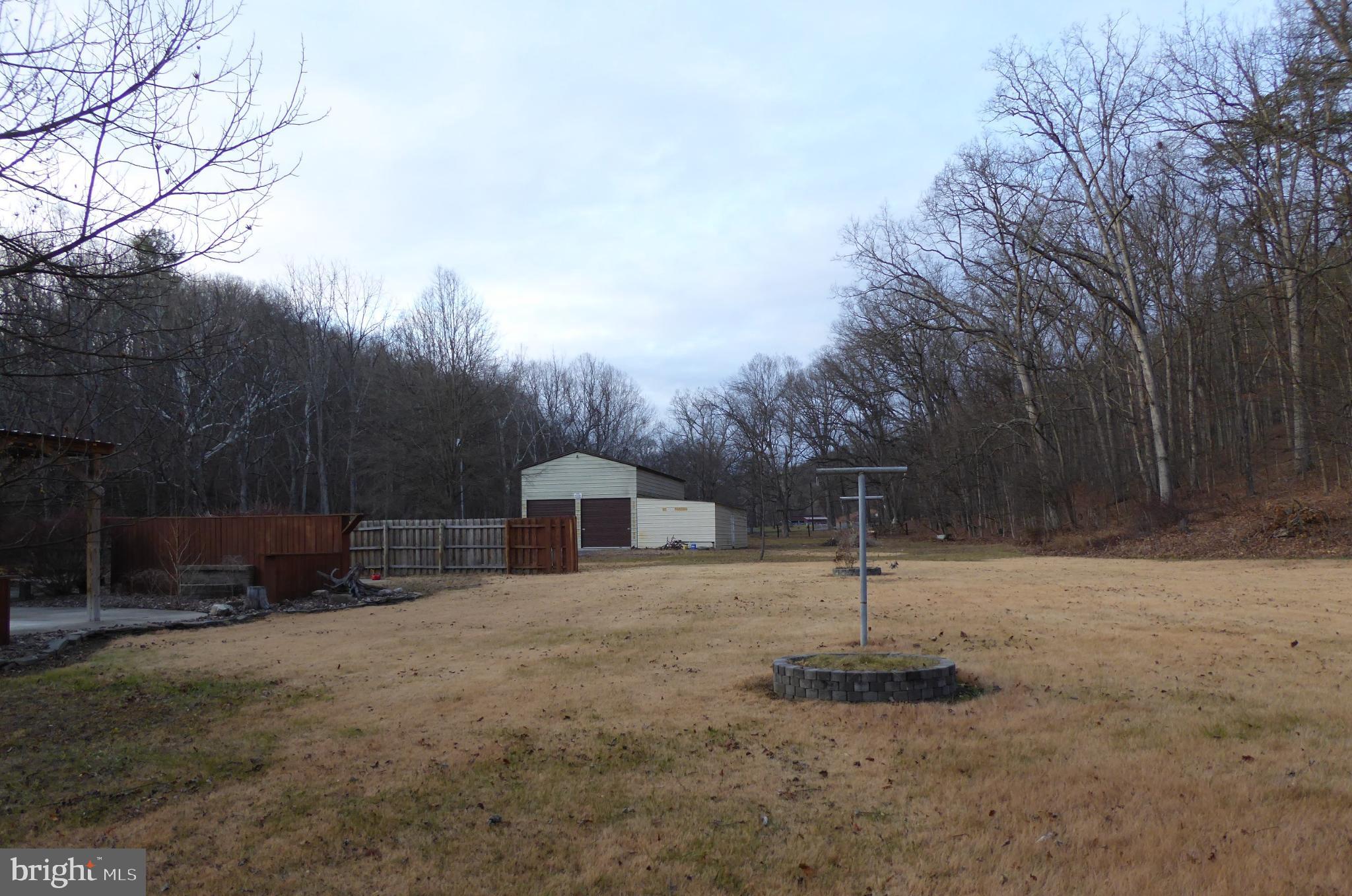 102 Dry Run Road Burlington, WV 26710 - Photo 14 of 85 Spacious lot nestled in serene woodlands.