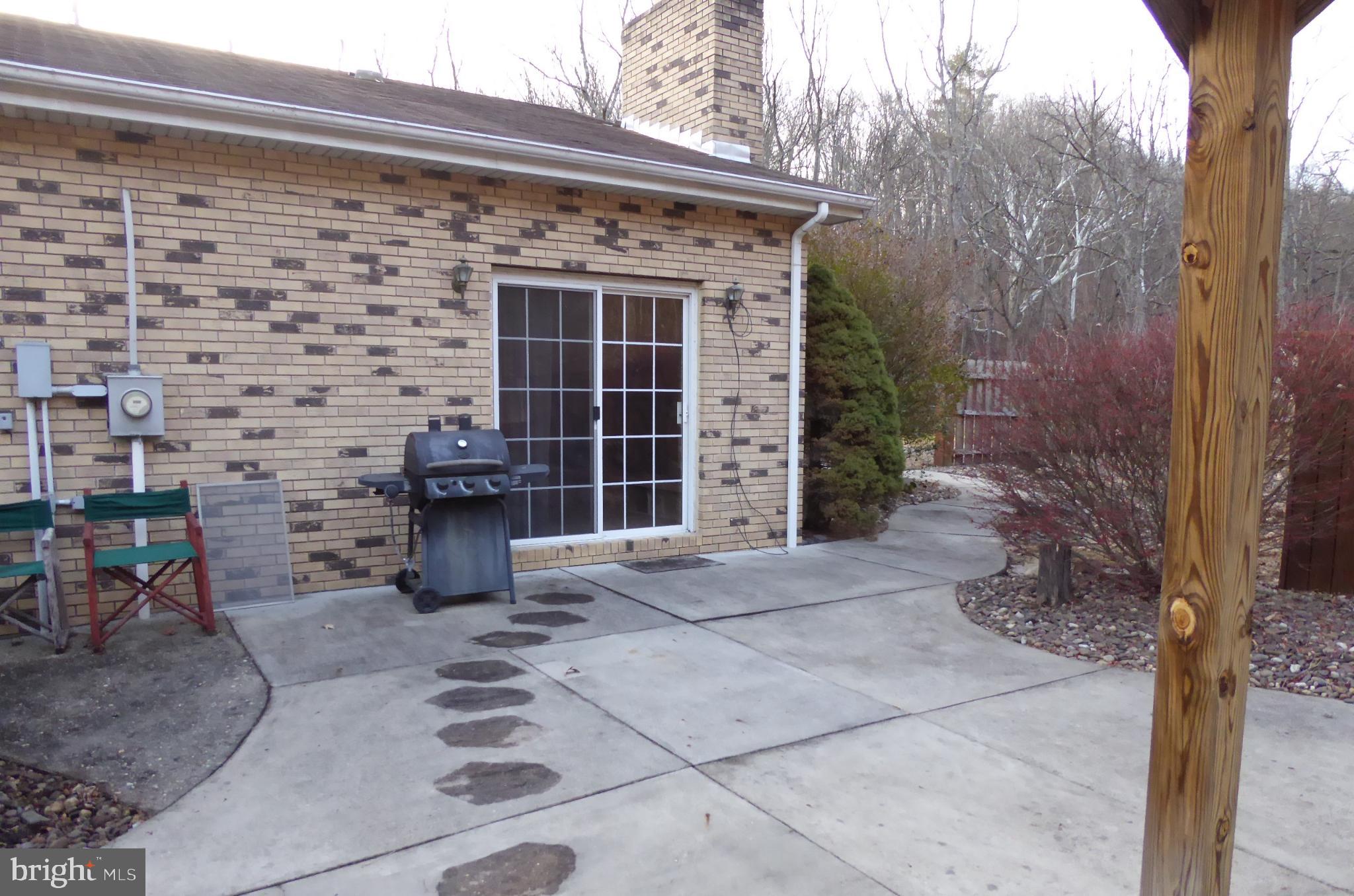 102 Dry Run Road Burlington, WV 26710 - Photo 20 of 85 Charming patio with inviting pathways.