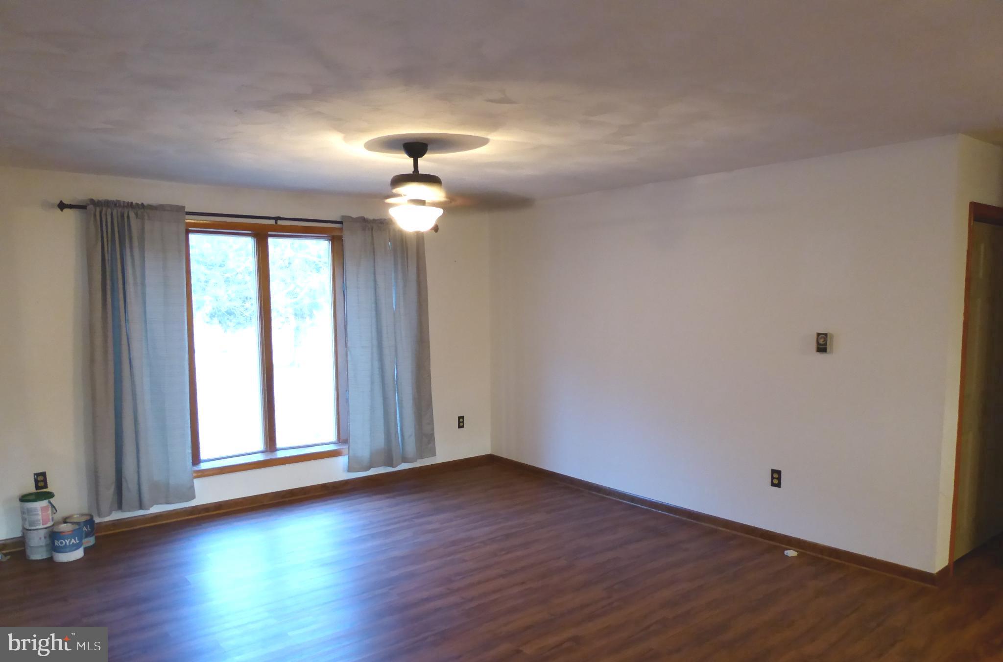 102 Dry Run Road Burlington, WV 26710 - Photo 38 of 85 Spacious room with natural light and charm.