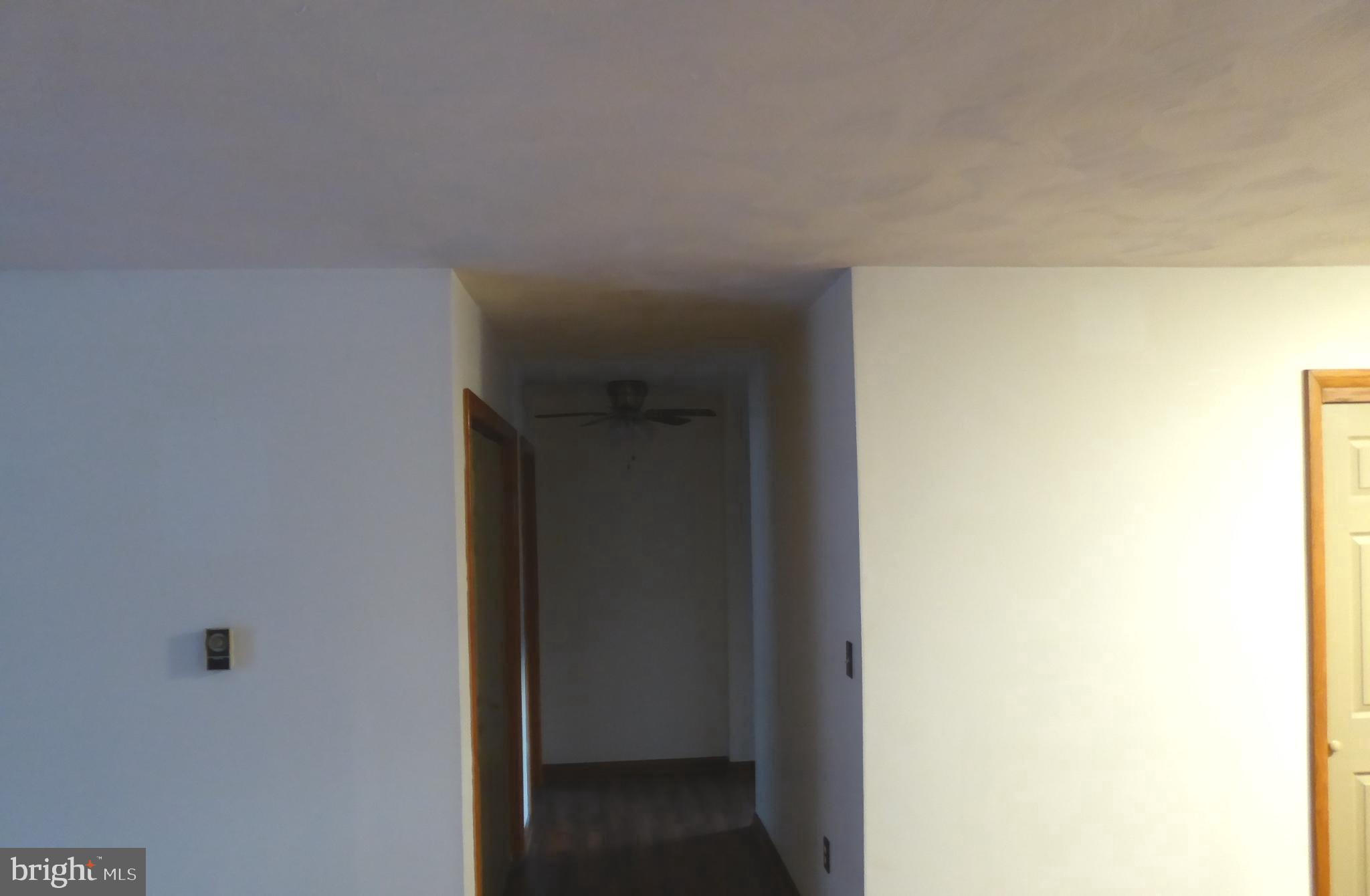 102 Dry Run Road Burlington, WV 26710 - Photo 39 of 85 Spacious hallway inviting exploration ahead.