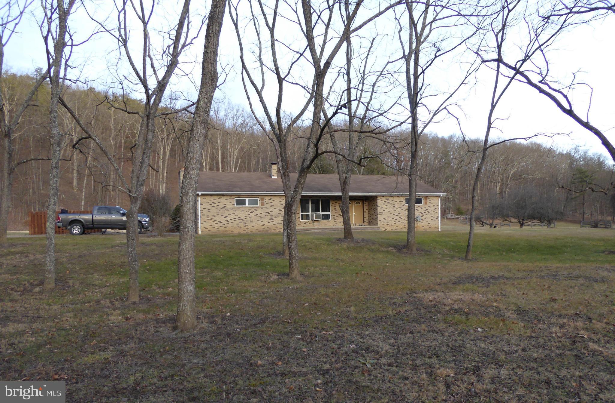 102 Dry Run Road Burlington, WV 26710 - Photo 6 of 85 Charming home nestled among tranquil trees.